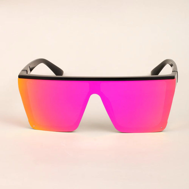 Large square safety glasses with gradient pink lenses and black frame, stylish and protective eyewear.